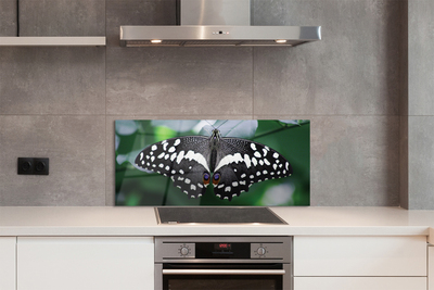 Panel Szklany Motyl na Zielonych Liściach