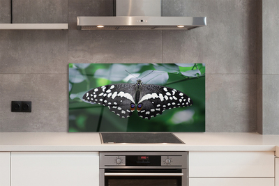 Panel Szklany Motyl na Zielonych Liściach