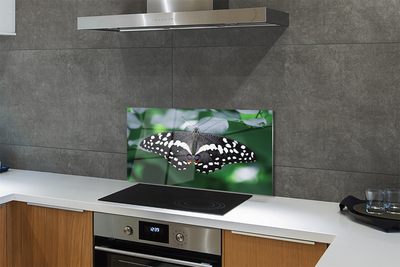 Panel Szklany Motyl na Zielonych Liściach