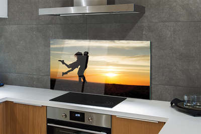 Panel szklany do Kuchni Ludzie na tle Wieczornych Chmur