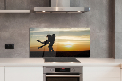 Panel szklany do Kuchni Ludzie na tle Wieczornych Chmur