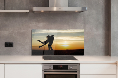 Panel szklany do Kuchni Ludzie na tle Wieczornych Chmur