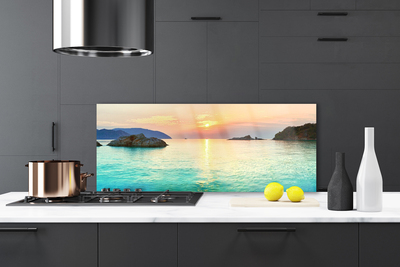 Panel Szklany Słoneczny Blask na Skalistym Brzegu