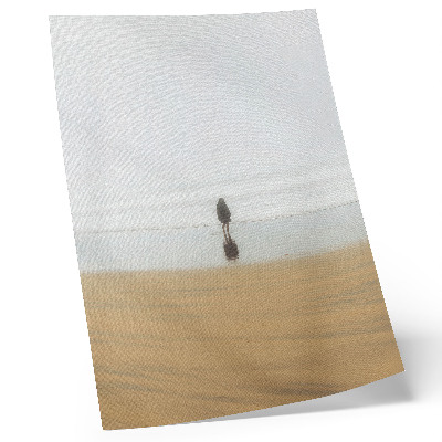 Plakat na płótnie Minimalizm spokój samotność plaża odbicie woda