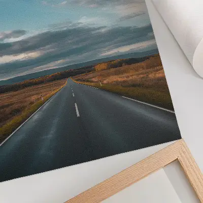 Droga przez jesienną równinę pod błękitnym niebem plakat z teksturą płótna