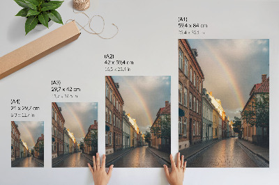 Plakat na płótnie Kolorowe kamienice tęcza pochmurne niebo
