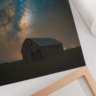 Plakat ścienny Nocne niebo z gwiazdami i drogą mleczną nad stodołą
