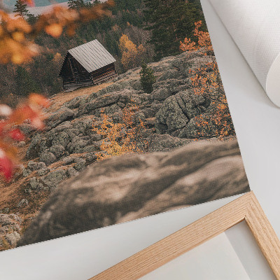 Plakat z teksturą płótna Domek na skale wśród drzew jesień spokojna natura