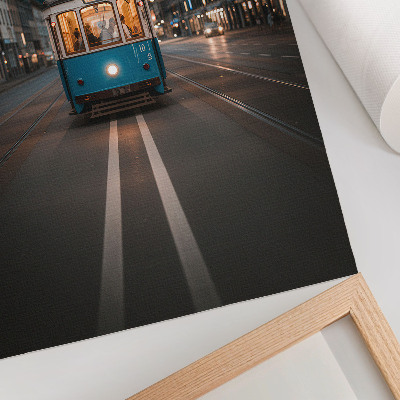 Plakat na płótnie Wieczór miasto tramwaj światła retro energia