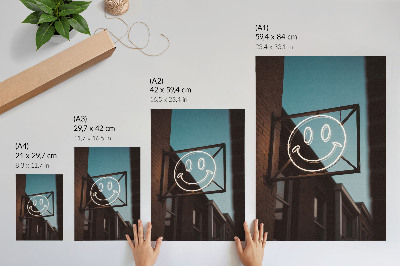 Nowoczesna grafika na płótnie Neonowa twarz przy ceglanej ścianie