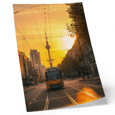 Plakat na płótnie Wieczorne miasto energia tramwaj życie ulice budynki