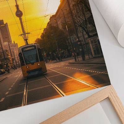Plakat na płótnie Wieczorne miasto energia tramwaj życie ulice budynki