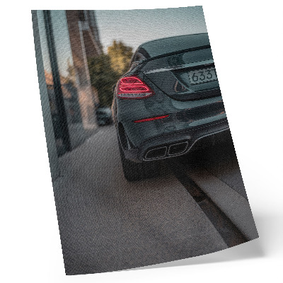Plakat na płótnie Stylowe auto w miejskiej przestrzeni