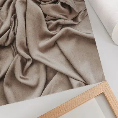 Plakat ścienny beżowy materiał z delikatnymi fałdami w przytulnym klimacie