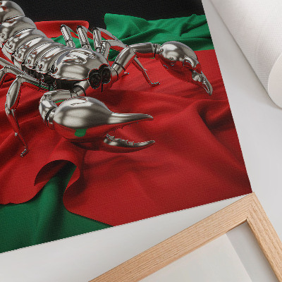 Plakat na płótnie Metaliczny skorpion na kolorowej tkaninie
