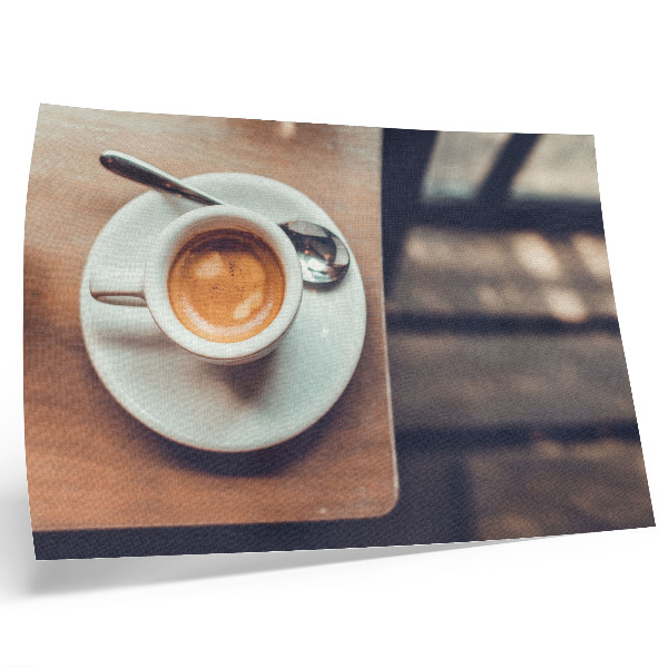 Wydruk na płótnie Filiżanka espresso na drewnianym stole kontrasty