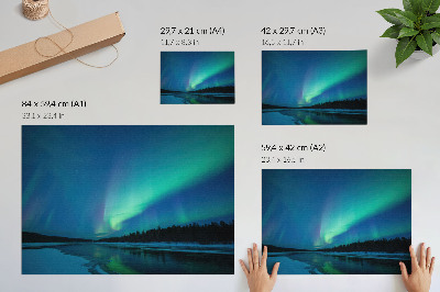 Plakat do salonu Zorza polarna nad zamarzniętym jeziorem nocą