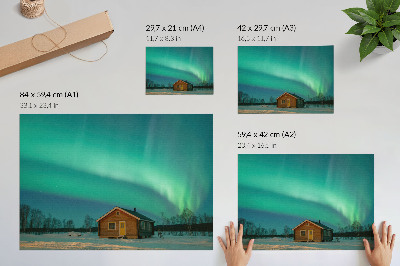 Plakat do salonu Zorza polarnej nad zimowym domkiem