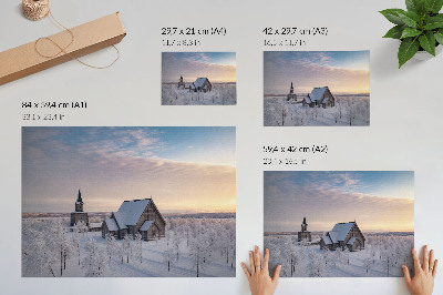 Plakat Spokojny zimowy pejzaż z drewnianym kościołem