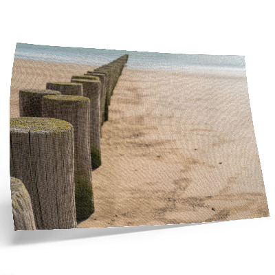 Plakat Drewniane paliki plaża morze spokój natura