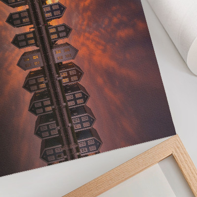 Grafika na ścianę Kolorowe domki nad wodą w świetle zachodu słońca