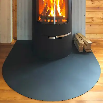 Półowalna podkładka pod kominek z czarnej metalowej blachy