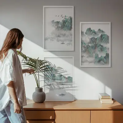 Zestaw 3 obrazów do salonu z górami, chmurami, ptakami i łodzią w stylu japandi