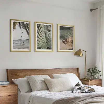 Zestaw 3 obrazów do salonu plaża z huśtawką i liśćmi w wakacyjnym klimacie