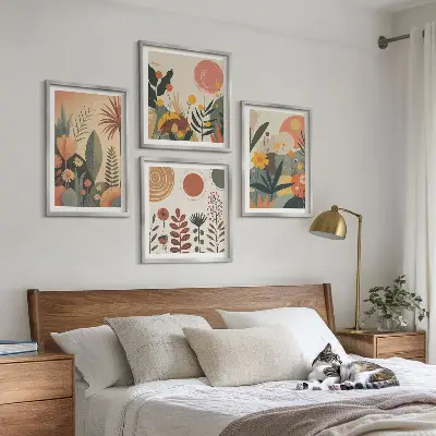 Zestaw 4 obrazów w ramie z motywem roślinnym w ciepłych barwach boho