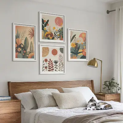 Zestaw 4 obrazów w ramie z motywem roślinnym w ciepłych barwach boho