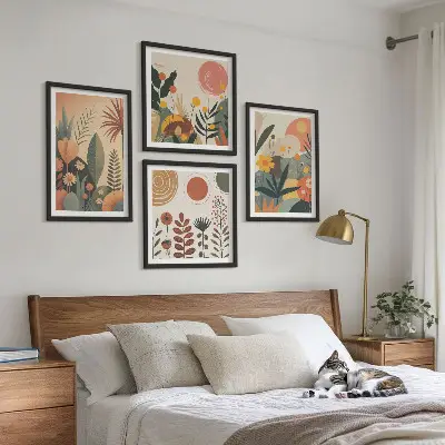 Zestaw 4 obrazów w ramie z motywem roślinnym w ciepłych barwach boho