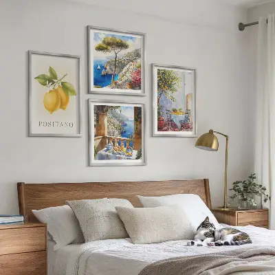 Zestaw 4 obrazów w ramie przedstawiających widoki Positano z motywem cytryn i architektury