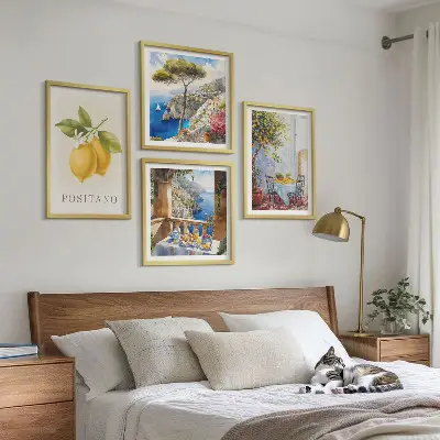 Zestaw 4 obrazów w ramie przedstawiających widoki Positano z motywem cytryn i architektury