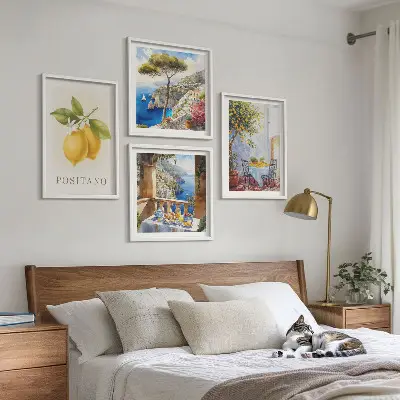 Zestaw 4 obrazów w ramie przedstawiających widoki Positano z motywem cytryn i architektury